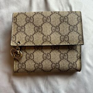 Authentic Gucci monogram folding wallet